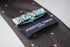 grey tie with pink polka dots