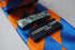 royal blue and orange barber striped tie