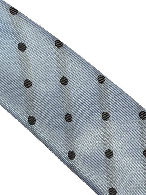 light blue tie with black polka dots