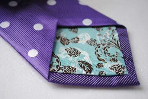 purple tie with white polka dots