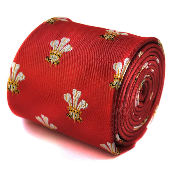 red tie with prince of wales feathers badge