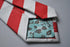 red and white barber striped tie