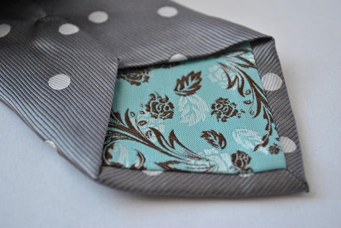 grey tie with white polka dots