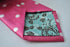 pink tie with white polka dots