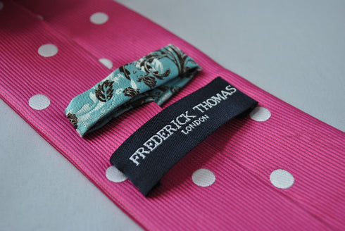 pink tie with white polka dots