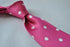 pink tie with white polka dots