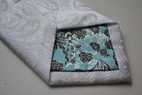 silver tie with paisley design