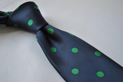 navy blue tie with green polka dots