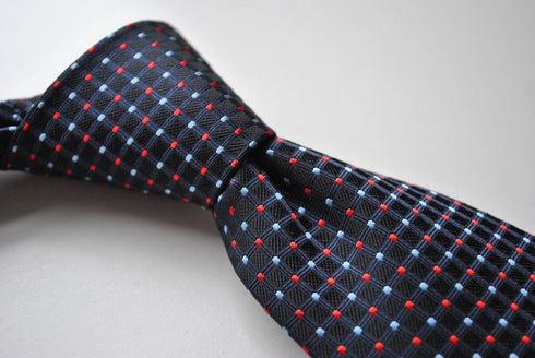 navy tie with red and light blue pin spots