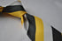 black, yellow and grey striped tie