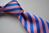 pink and blue striped tie