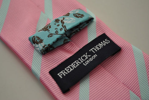pink and light blue striped tie