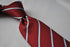 maroon and thin blue striped tie
