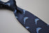 navy tie with dolphin design