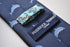 navy tie with dolphin design