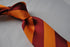 burnt orange and maroon barber striped tie