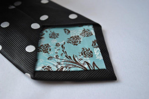 black tie with white polka dots