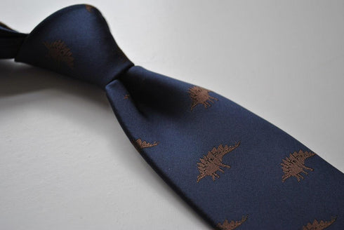 navy blue tie with stegosaurus dinosaur design
