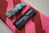 pink and maroon barber striped tie