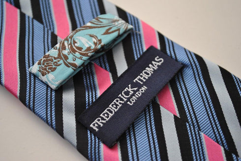 pink, blue and black striped tie