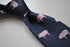 navy tie with pig design
