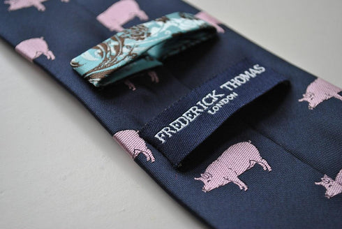 navy tie with pig design