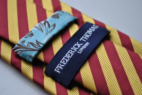 maroon and gold striped tie