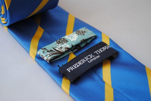 royal blue and yellow striped design tie