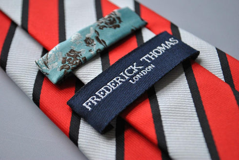 red, black and white striped tie