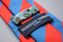 red and royal blue barber striped tie