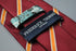 maroon and orange ribbon striped tie
