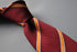 maroon and orange ribbon striped tie