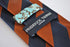 navy blue and brown barber striped tie