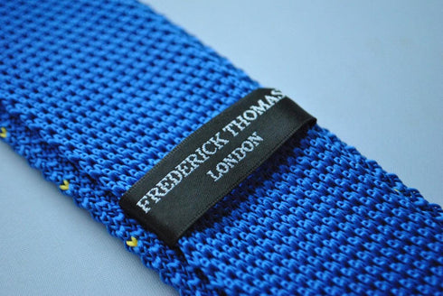 royal blue skinny knitted tie with yellow polka dot design