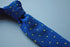 royal blue skinny knitted tie with yellow polka dot design