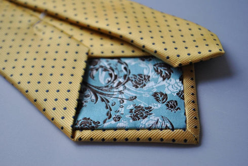 yellow gold with black pin spots tie