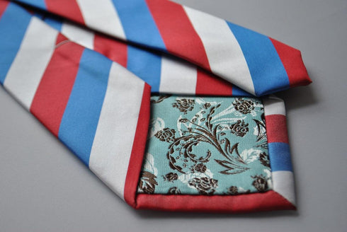 red, blue and white striped tie