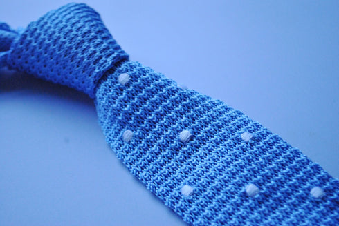 light blue skinny knitted tie with white polka dots