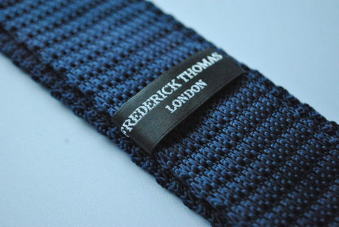 navy blue skinny knitted tie with bright pink polka dots