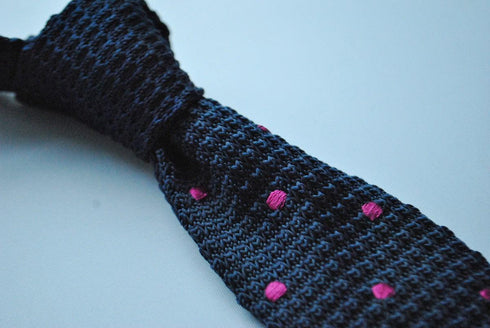 navy blue skinny knitted tie with bright pink polka dots