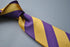 purple and yellow barber striped tie