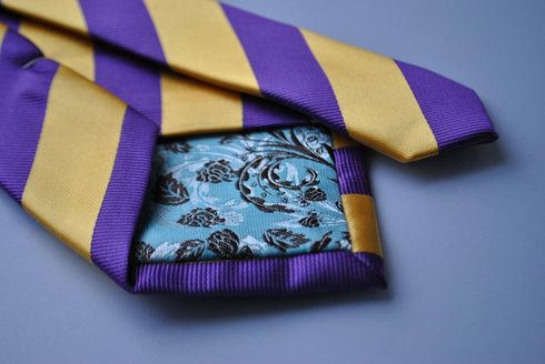 purple and yellow barber striped tie