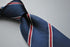 navy with red club striped tie