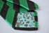green and black barber striped tie