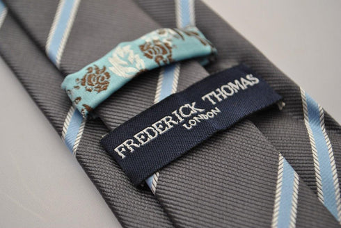 grey tie with light blue stripe