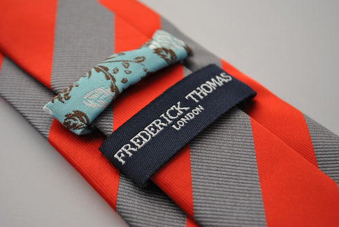 grey and red barber striped tie