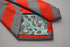 grey and red barber striped tie
