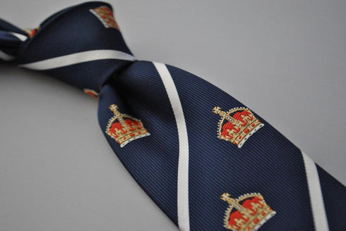 navy blue tie with crown design and white stripes