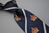navy blue tie with crown design and white stripes