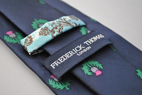 navy tie with scottish thistle design